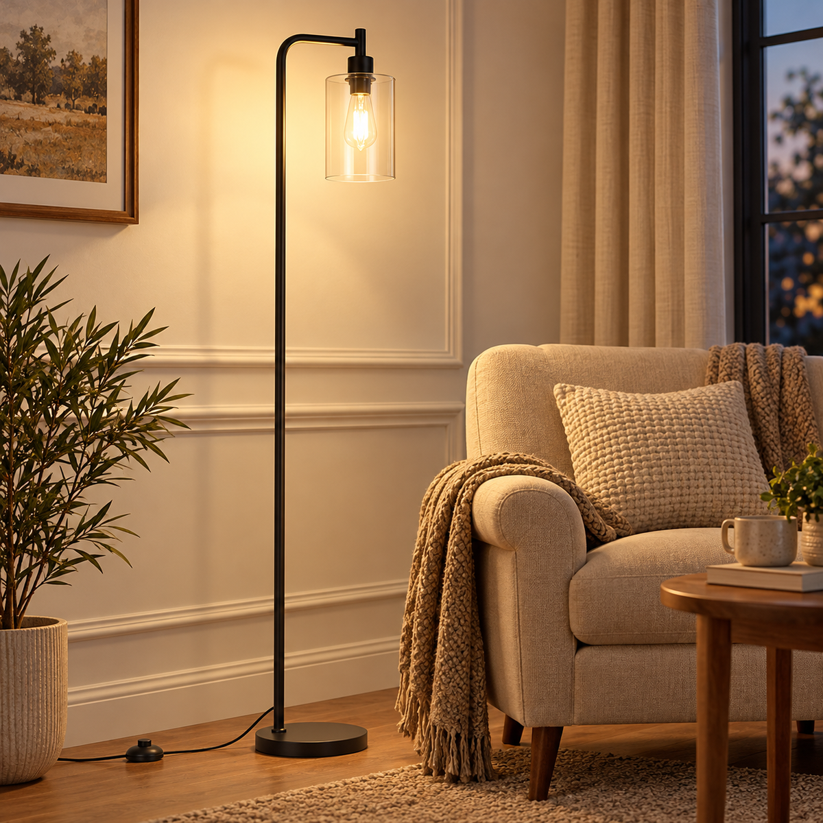 Clear glass black floor lamp standing beside a beige armchair in a warmly lit reading corner.