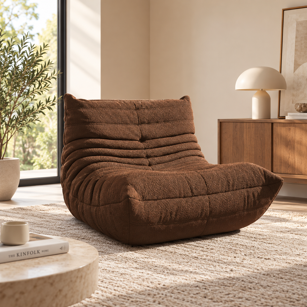 HavvakHome rich brown bouclé lounge chair in a modern living room setting.
