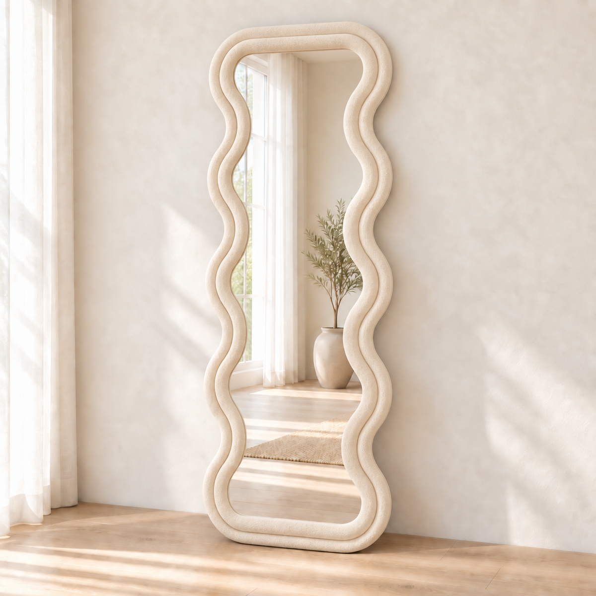 HavvakHome warm cream wavy full-length floor mirror in a modern room setting.