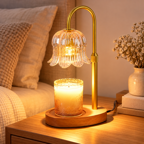 Amber variant HavvakHome flower glass candle warmer lamp with timer captured from a side angle in a bedroom setting.