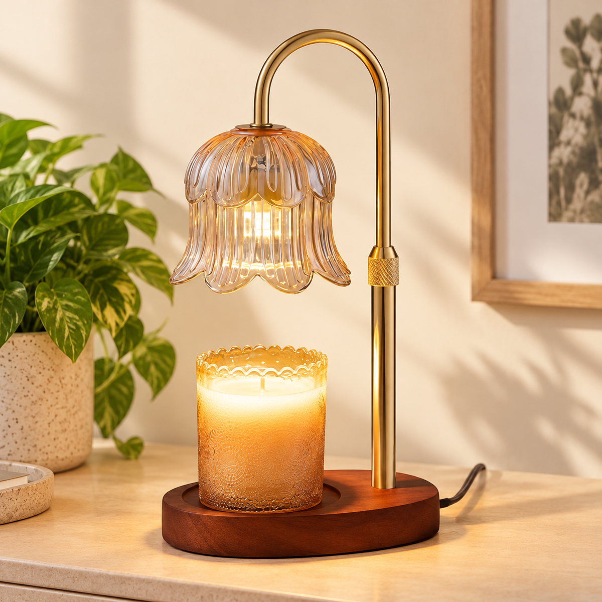 HavvakHome flower glass candle warmer lamp with timer in amber-electroplated gold variant viewed from a front angle on a natural tabletop.
