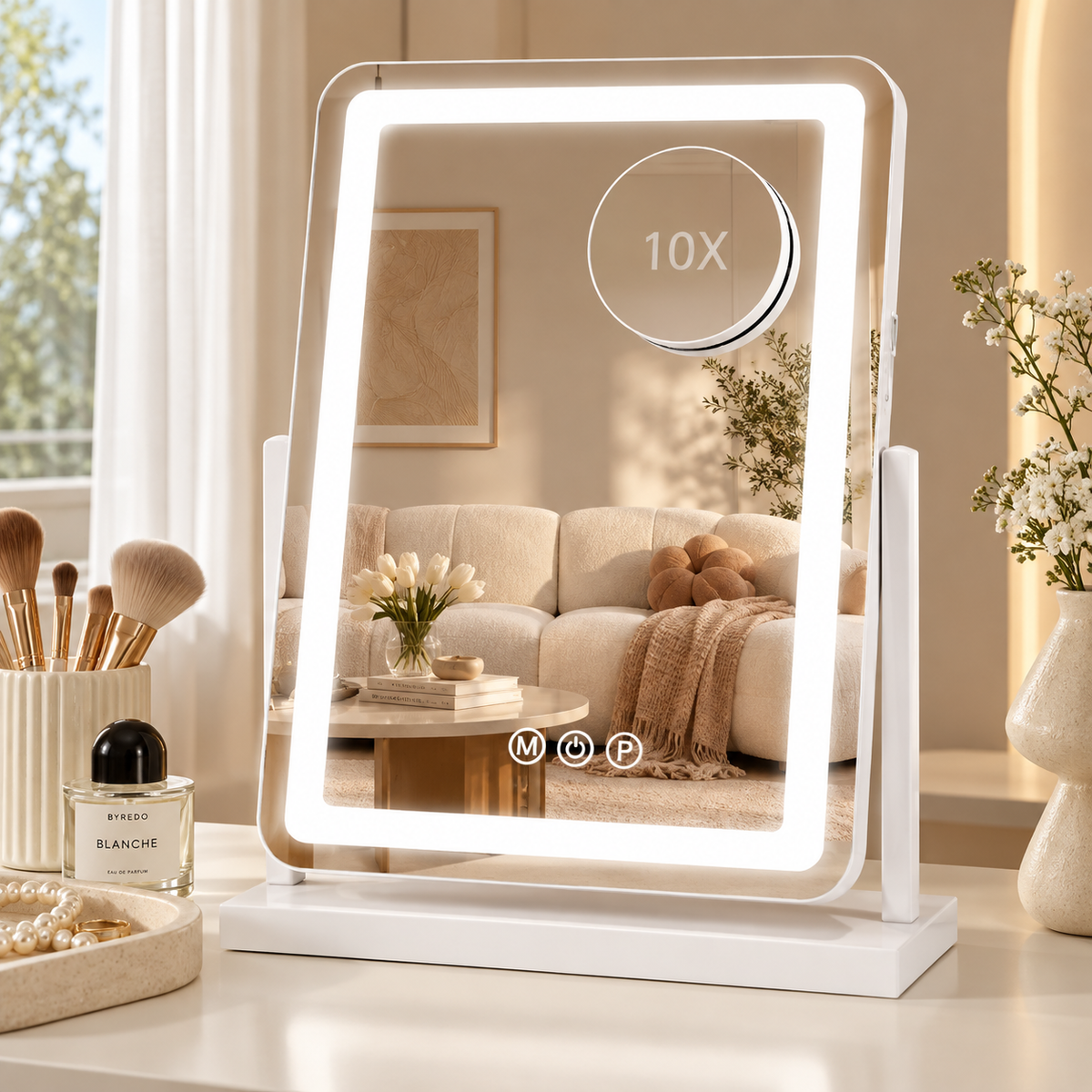 Portrait white LED tabletop mirror with round magnifying attachment marked 10X, touch icons, and a living room reflection by HavvakHome.