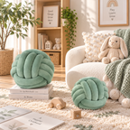 HavvakHome mint green knot ball pillows styled on books and a cream shag rug in a sunlit room.