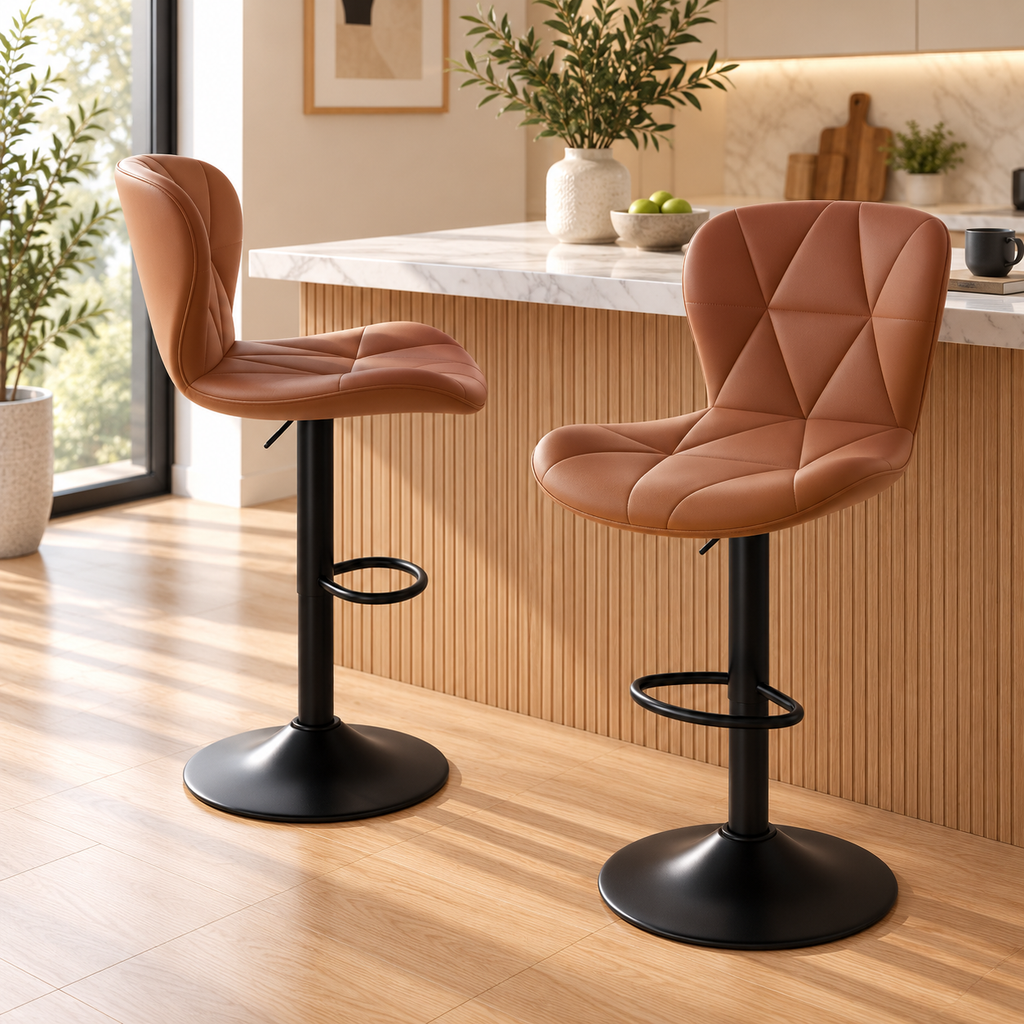 Two brown quilted bar stools with black pedestal bases shown from side and front three-quarter angles beside a kitchen island by HavvakHome.