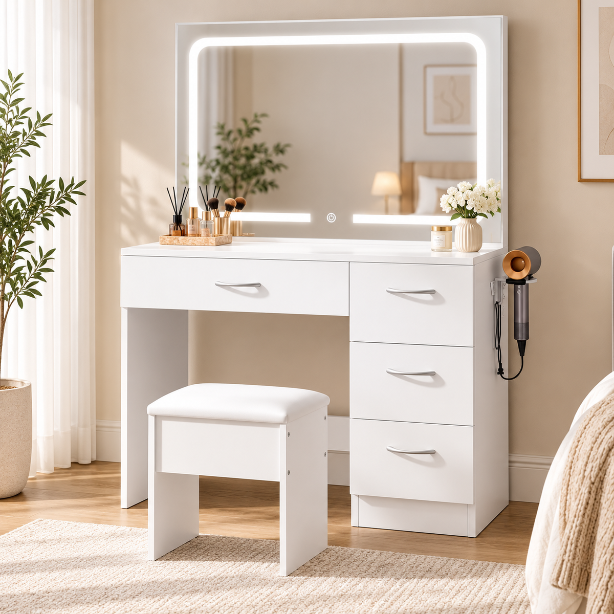 HavvakHome white vanity desk with illuminated rectangular LED-framed mirror, drawers, and matching padded stool set beside a window in a bedroom with cosmetics and a flower vase on the desktop.
