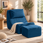 Blue corduroy lounge chair with matching pillow, ottoman, and cream throw beside a window and plant by HavvakHome.