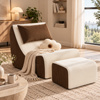 Cream and brown two-tone lounge chair and ottoman with brown back pillow, cream flower cushion, and knitted throw beside a window by HavvakHome.