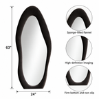 Black wavy flannel-framed mirror dimensions infographic showing 63 by 24 inches, with close-ups of the padded frame, reflective surface, and base.
