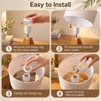 Four-step small tripod table lamp installation guide showing hands removing the fixing ring, placing the beige shade, tightening the ring, and inserting the bulb by HavvakHome.